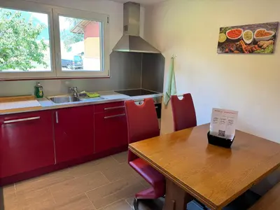 Küche/Küchenzeile in der Unterkunft See und Berge Loft
