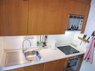 Küche/Küchenzeile in der Unterkunft Apartment Les Arolles B12 by Interhome