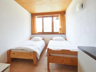 Ein Bett oder Betten in einem Zimmer der Unterkunft Apartment Dixence 109 by Interhome