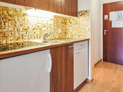 Küche/Küchenzeile in der Unterkunft Studio Greppon 110 by Interhome