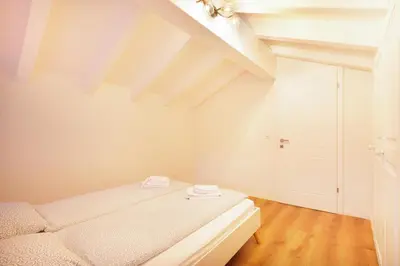 Ein Bett oder Betten in einem Zimmer der Unterkunft Rossignol II