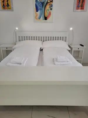 Ein Bett oder Betten in einem Zimmer der Unterkunft Vertical Apartment