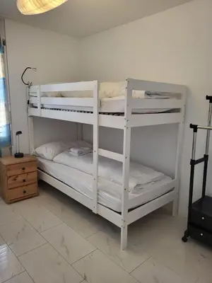 Ein Bett oder Betten in einem Zimmer der Unterkunft Vertical Apartment