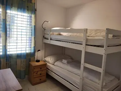 Ein Bett oder Betten in einem Zimmer der Unterkunft Vertical Apartment