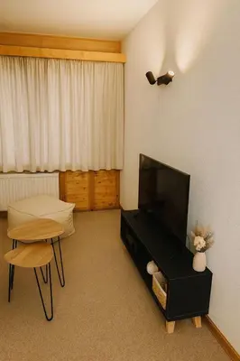 Ein Sitzbereich in der Unterkunft Charmant duplex à 3min des remontées mécaniques