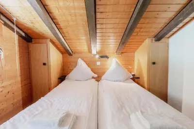 Ein Bett oder Betten in einem Zimmer der Unterkunft Charmant duplex à 3min des remontées mécaniques