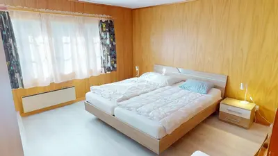 Ein Bett oder Betten in einem Zimmer der Unterkunft Chalet Bürcher