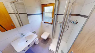 Ein Badezimmer in der Unterkunft Chalet Bürcher