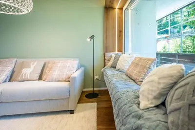 Ein Sitzbereich in der Unterkunft Haus Cervino - luxury apartment