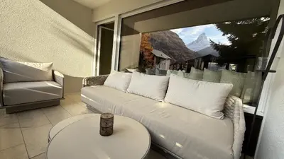 Ein Sitzbereich in der Unterkunft Haus Cervino - luxury apartment