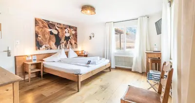 Ein Bett oder Betten in einem Zimmer der Unterkunft Hotel Kaiserstuhl