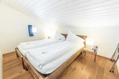 Ein Bett oder Betten in einem Zimmer der Unterkunft Hotel Kaiserstuhl