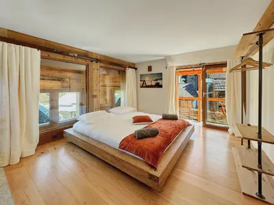 Ein Bett oder Betten in einem Zimmer der Unterkunft Pilanous House - Penthouse suite - Swiss Alps
