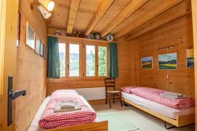 Ein Bett oder Betten in einem Zimmer der Unterkunft Chalet Meiseli