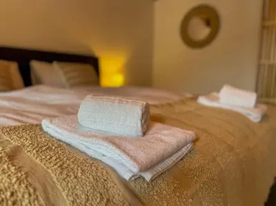 Ein Bett oder Betten in einem Zimmer der Unterkunft City Center View Apartment 2