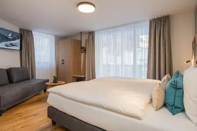Ein Bett oder Betten in einem Zimmer der Unterkunft Arctis - Wohnung Lea