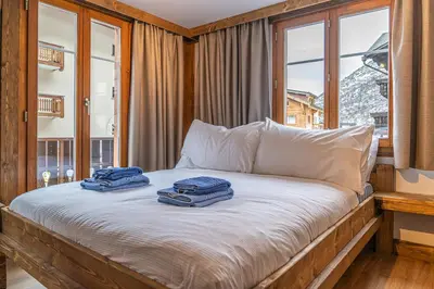 Ein Bett oder Betten in einem Zimmer der Unterkunft Chalet Edelweiss