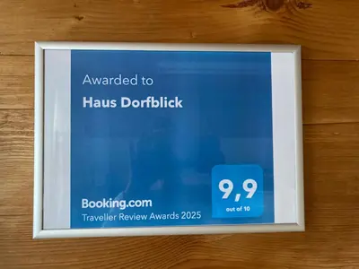 Ein Zertifikat, Auszeichnung, Logo oder anderes Dokument, das in der Unterkunft Haus Dorfblick ausgestellt ist