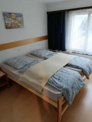 Ein Bett oder Betten in einem Zimmer der Unterkunft Kummublick Täsch, Nähe Zermatt