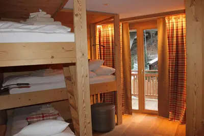 Ein Bett oder Betten in einem Zimmer der Unterkunft Chalet Binna
