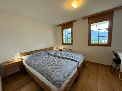 Ein Bett oder Betten in einem Zimmer der Unterkunft Ferienwohnung Aspa EG Ost