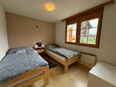 Ein Bett oder Betten in einem Zimmer der Unterkunft Ferienwohnung Aspa EG Ost