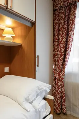 Ein Bett oder Betten in einem Zimmer der Unterkunft Maison Alpina l Golf l By CosyHome