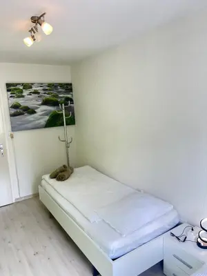 Ein Bett oder Betten in einem Zimmer der Unterkunft Diamant Apartment