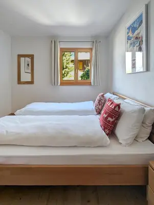 Ein Bett oder Betten in einem Zimmer der Unterkunft Paisible apt cheminée, terrasse, jardin, vue époustouflante