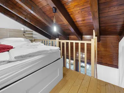 Ein Bett oder Betten in einem Zimmer der Unterkunft Apartment Haus Rossignol B Apartment 2E by Interhome