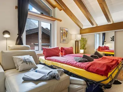 Ein Bett oder Betten in einem Zimmer der Unterkunft Apartment Haus Bodmen B Apartment B 43 by Interhome