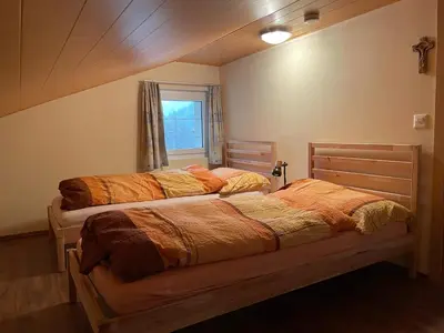 Ein Bett oder Betten in einem Zimmer der Unterkunft Cresta Loft in Saas-Grund