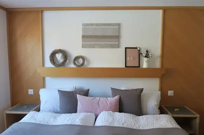 Ein Bett oder Betten in einem Zimmer der Unterkunft Apartment Bergfreude