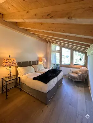 Ein Bett oder Betten in einem Zimmer der Unterkunft Turquino Loft - Duplex 4 Bedroom Chalet in Zermatt