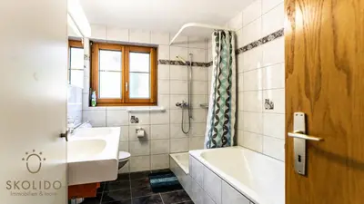 Ein Badezimmer in der Unterkunft Ferienwohnung Haus Binelti, Fiesch