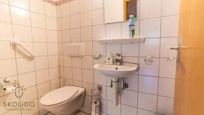Ein Badezimmer in der Unterkunft Ferienwohnung Haus Binelti, Fiesch