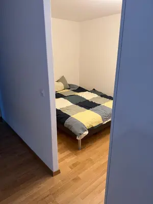 Ein Bett oder Betten in einem Zimmer der Unterkunft Modernes Ferienglück