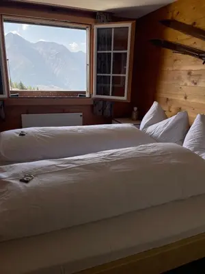 Ein Bett oder Betten in einem Zimmer der Unterkunft Chalet La Montanara