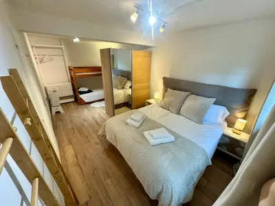 Ein Bett oder Betten in einem Zimmer der Unterkunft Appartement central avec Spa