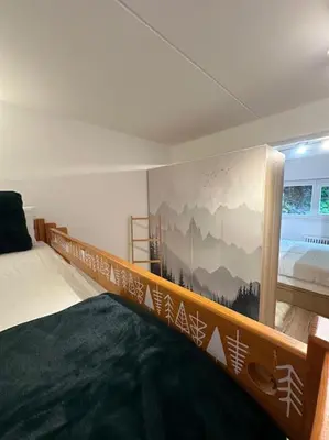 Ein Bett oder Betten in einem Zimmer der Unterkunft Appartement central avec Spa