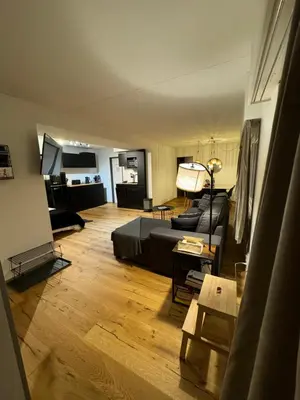 Ein Sitzbereich in der Unterkunft Appartement central avec Spa