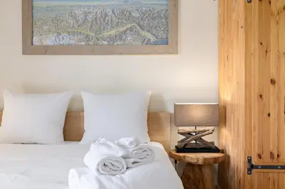 Ein Bett oder Betten in einem Zimmer der Unterkunft Cabane de la Delege -Crans Montana- Amazing Views