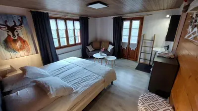Ein Bett oder Betten in einem Zimmer der Unterkunft Auberge Restaurant les Aiguilles Rouges