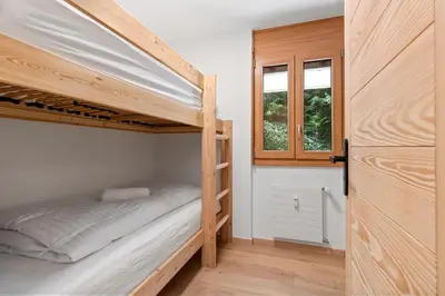 Ein Bett oder Betten in einem Zimmer der Unterkunft Magnifique appartement avec piscine