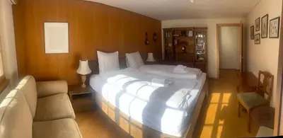 Ein Bett oder Betten in einem Zimmer der Unterkunft Chalet Bärli