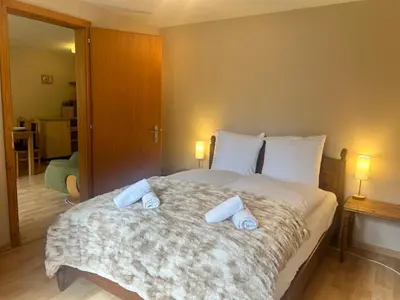 Ein Bett oder Betten in einem Zimmer der Unterkunft Chalet Bärli