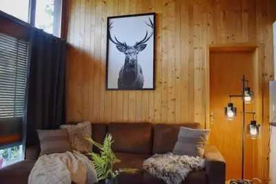 Ein Sitzbereich in der Unterkunft Nature's Getaway