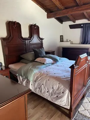 Ein Bett oder Betten in einem Zimmer der Unterkunft Rustico Corte