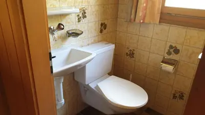 Ein Badezimmer in der Unterkunft Chalet Hinkelstein in Beatenberg traumhafte Aussicht auf Eiger, Mönch & Jungfrau