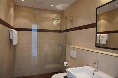 Ein Badezimmer in der Unterkunft Exklusive Wohnung mit Panoramasicht auf Melchsee-Frutt